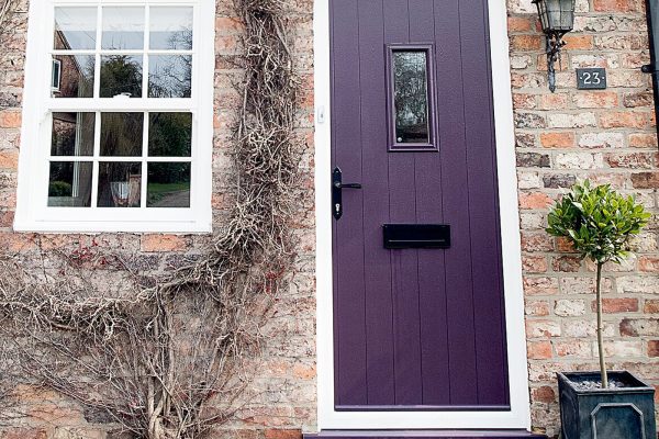 purple composite door with casement upvc window