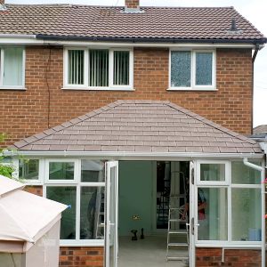 Designer conservatories with solid tiled roof