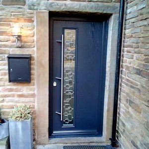 Anthracite colour doors with silver bar and canvas glass
