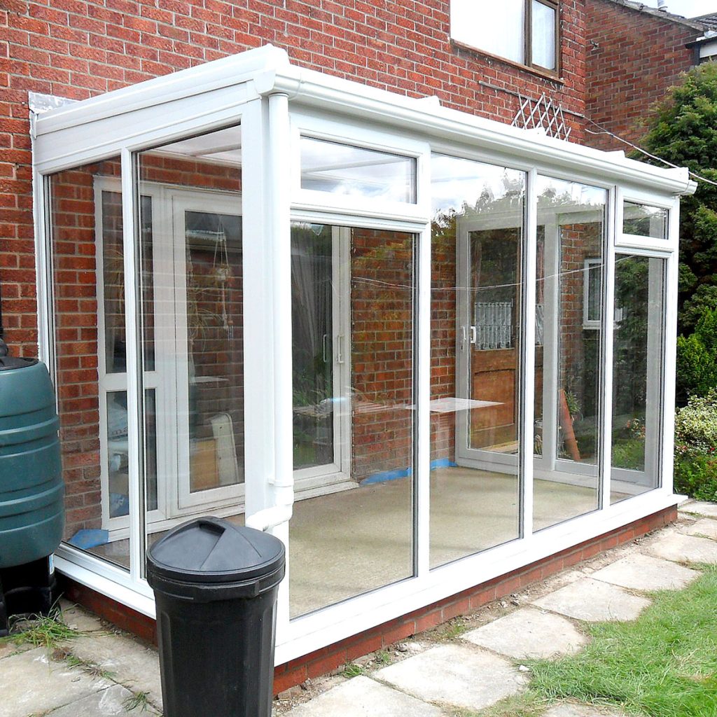 lean-to white glass room or garden room